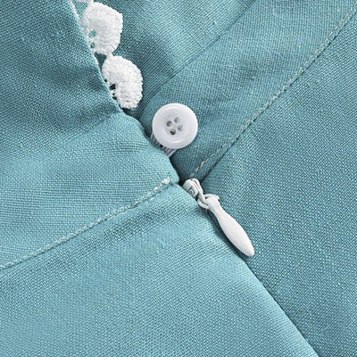 Türkises Kleid aus den 1950er Jahren