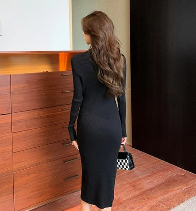 Schwarzes, figurbetontes Vintage-Kleid aus den 1940er Jahren