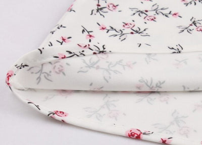 Großes Vintage-Kleid aus den 50er Jahren mit weißen Blumen