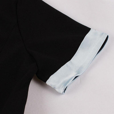 Silbernes schwarzes Vintage-Kleid