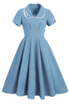 Blaues Vintage-Kleid im 50er-Jahre-Stil