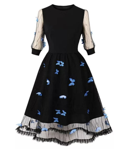 Blaues Schmetterlings-Pin-Up-Kleid im 50er-Jahre-Stil