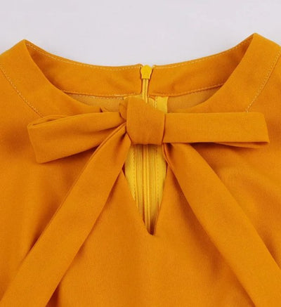 Orangefarbenes 60er-Jahre-Kleid