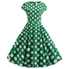Ausgestelltes grünes Vintage-Kleid mit weißen Tupfen