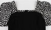 Schwarzes Vintage-Kleid im 50er-Jahre-Stil