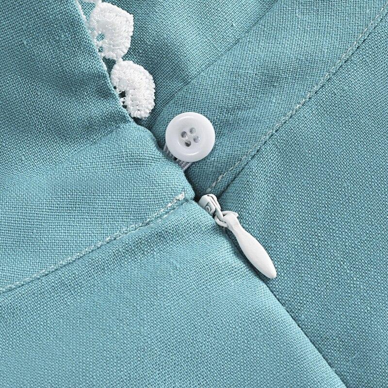 Türkises Kleid aus den 1950er Jahren