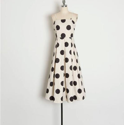 Weißes gepunktetes Vintage-Kleid