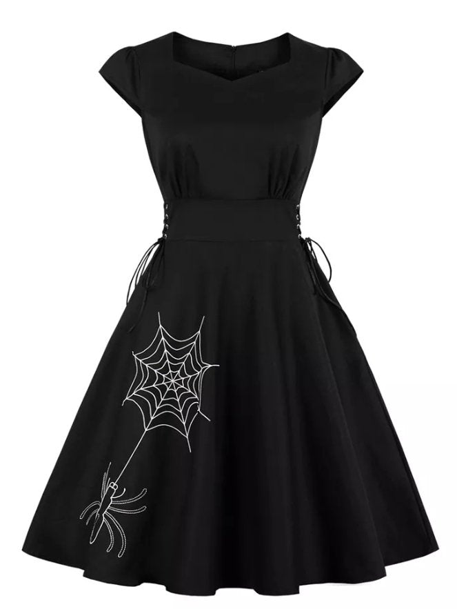 Beiges Spinnen-Vintage-Kleid