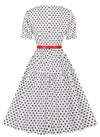 Weißes, gepunktetes Vintage-Kleid mit Rundhalsausschnitt