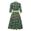 Grünes elegantes Vintage-Kleid