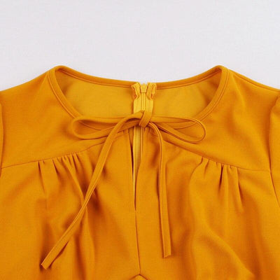 Orangefarbenes Vintage-Kleid in Übergröße