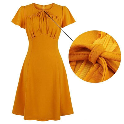 Orangefarbenes Vintage-Kleid in Übergröße