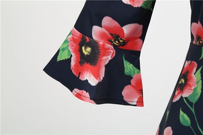 Schwarzes Mohnblumen-Winter-Vintage-Kleid