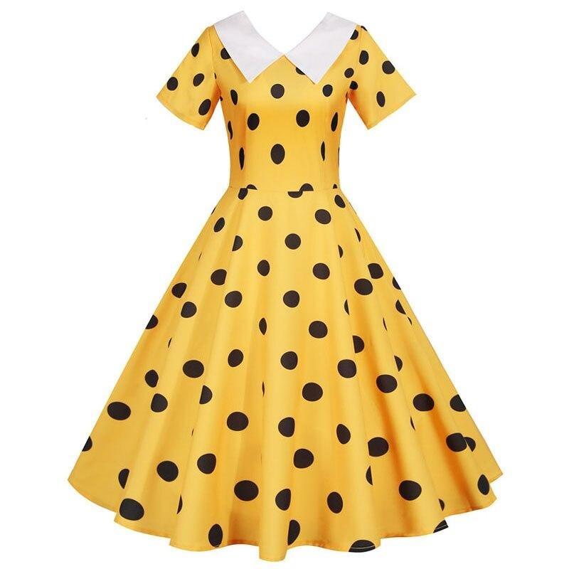 Gelbes Vintage-Kleid mit schwarzen Punkten