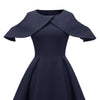 Marineblaues Vintage-Kleid mit Rüschenkragen