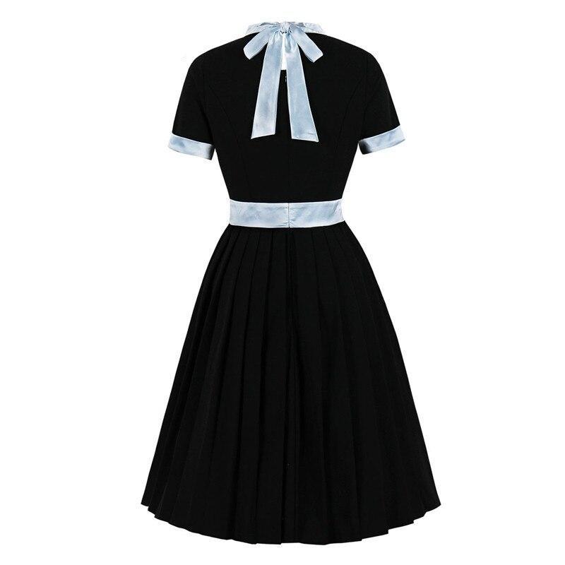 Silbernes schwarzes Vintage-Kleid