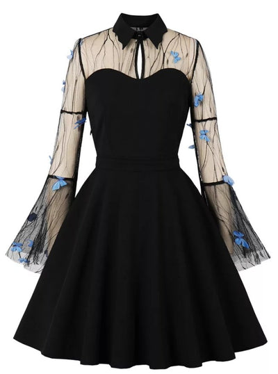 Vintage-Kleid mit Pin-Up-Schmetterlingen