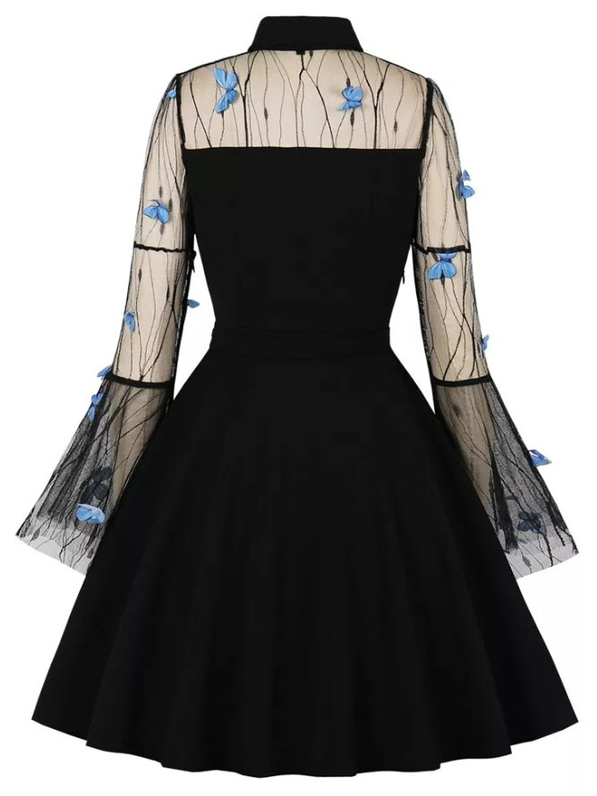 Vintage-Kleid mit Pin-Up-Schmetterlingen