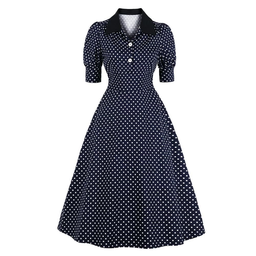 Marineblaues, gepunktetes Vintage-Kleid