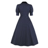 Marineblaues, gepunktetes Vintage-Kleid