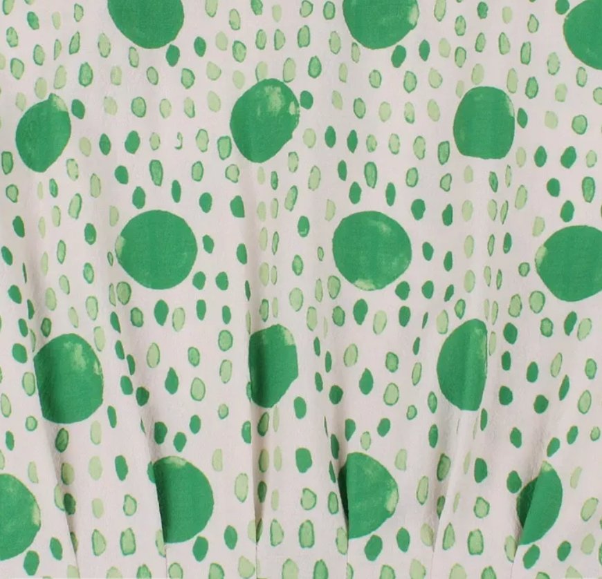 Gepunktetes, gestreiftes Vintage-Kleid