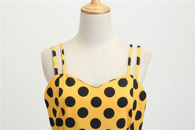Gepunktetes gelbes Rockabilly-Vintage-Kleid