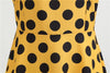 Gepunktetes gelbes Rockabilly-Vintage-Kleid