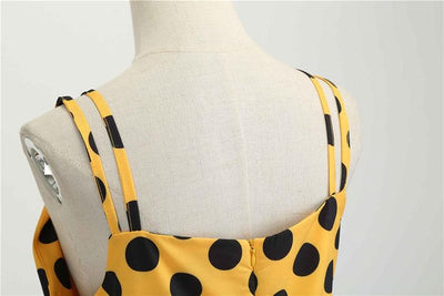 Gepunktetes gelbes Rockabilly-Vintage-Kleid